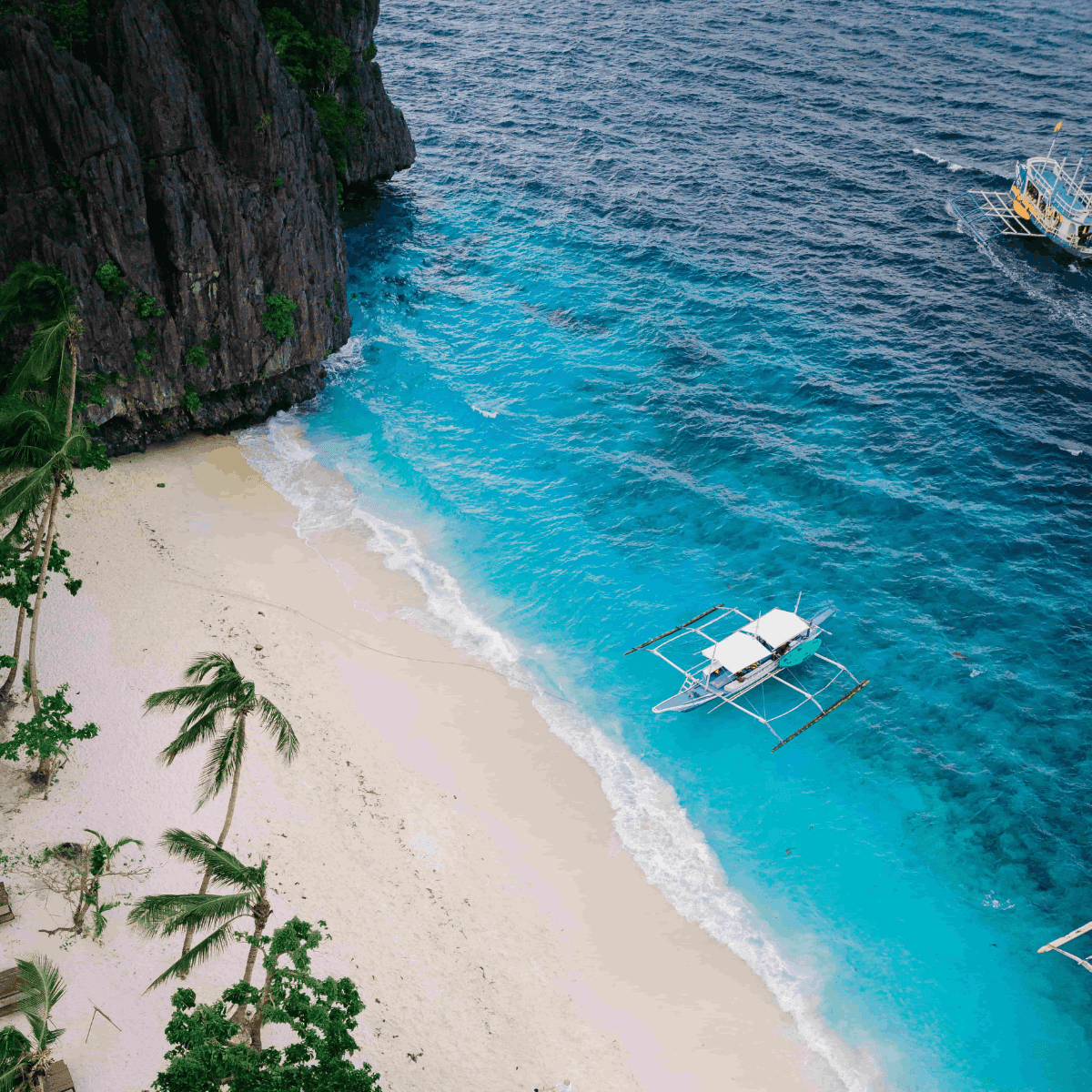 Aerial view of El Nido lagoons with bangka boats, Palawan